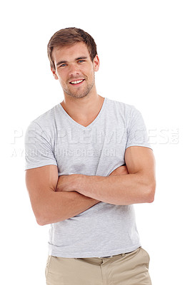 Buy stock photo Man, portrait and happy or arms crossed in studio with casual fashion, confidence and trendy outfit with pride. Model, cool person and smile with relax, good mood and tshirt on white background