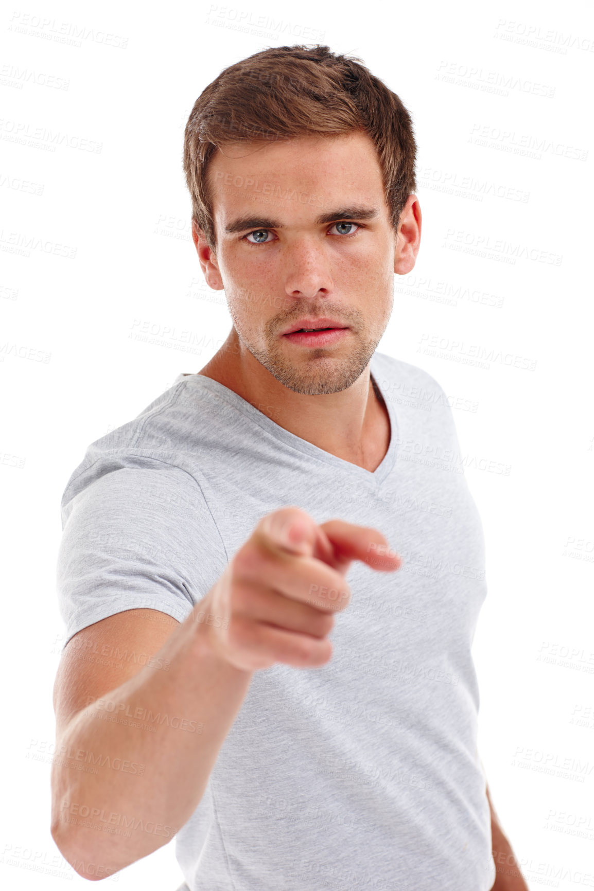 Buy stock photo Pointing, serious and portrait of man on a white background for problem, strict and conflict. Anger, fight and isolated person with hand sign, finger and gesture in studio with frustrated reaction
