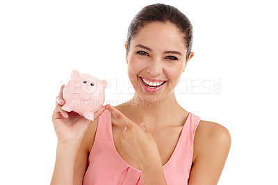 Buy stock photo Portrait, happy woman and pointing at piggy bank for budget, finance or invest in studio. Face, smile or person with money box for savings, income or security of profit isolated on a white background