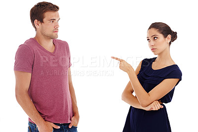 Buy stock photo Cropped shot of a gorgeous young couple arguing while standing in a studio-isolated on white