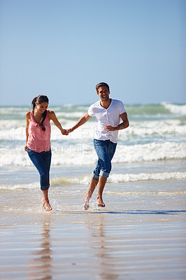 Buy stock photo Love, holding hands and couple at the beach running for adventure, fun or bonding in nature. Ocean, water and people at sea with energy, freedom or romance on travel, journey or vacation in Florida