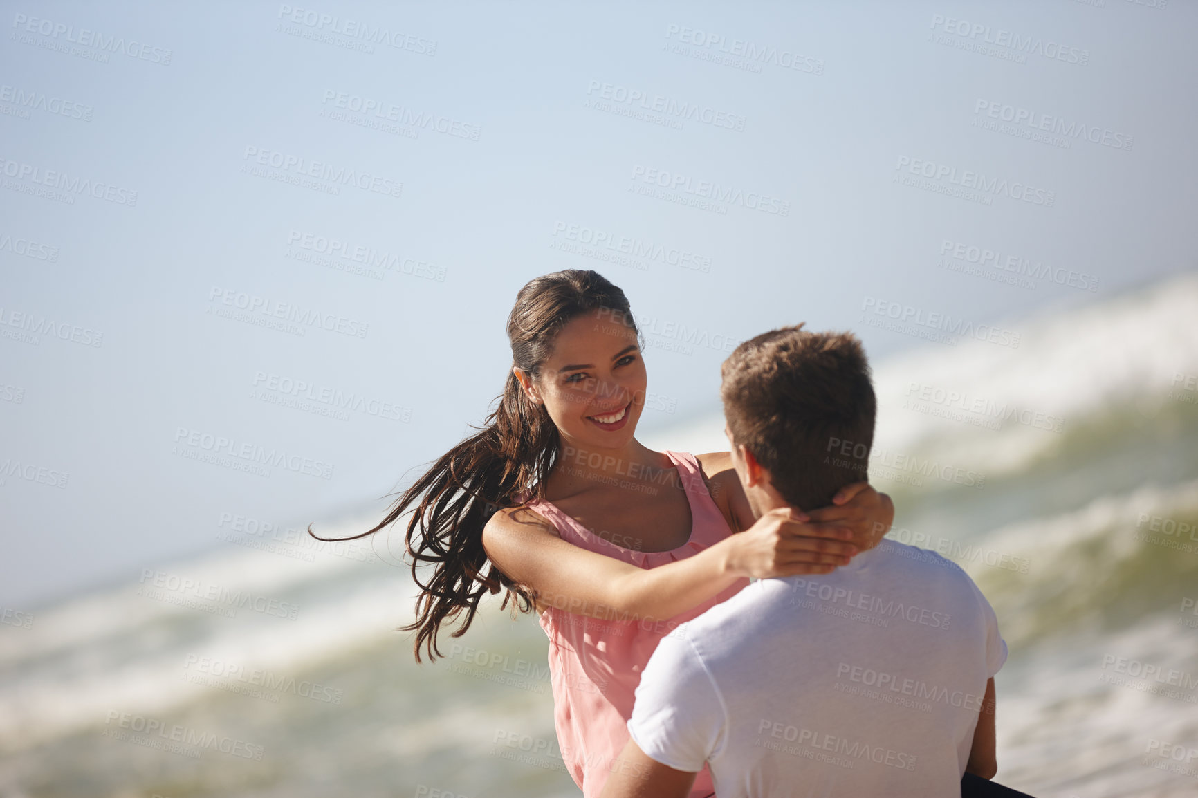 Buy stock photo Happy couple, portrait and hug on beach with embrace for love, care or support on holiday or outdoor weekend. Man carrying woman with smile for summer fun or bonding by ocean coast on mockup space