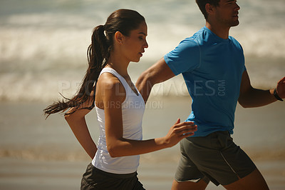 Buy stock photo Couple, fitness and runner on beach with partner in exercise, workout or outdoor training together. Man and woman enjoying sport or running for physical activity or cardio on ocean coast in nature