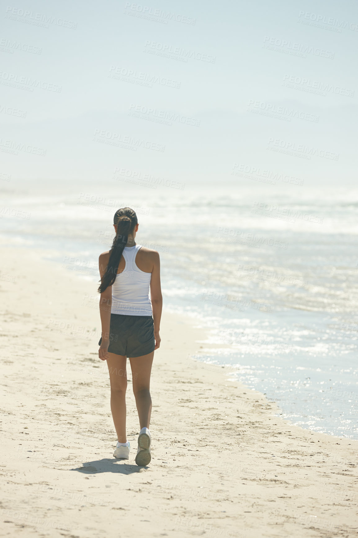 Buy stock photo Back, beach and woman with exercise, fitness and wellness with vacation and cardio for morning routine. Training, seaside and athlete with energy and runner with endurance and healthy with progress