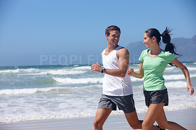 Buy stock photo Sunshine, beach and running with couple, fitness and energy with wellness or practice with morning routine. Seaside, summer or man with woman or runner with training or hobby with exercise or workout