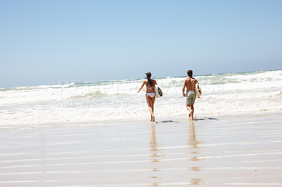 Buy stock photo Couple, beach and surfboard for surfing or rear view with waves, adventure and fitness with blue sky. Tourist, people and surfer by ocean in morning for holiday, vacation and freedom in California