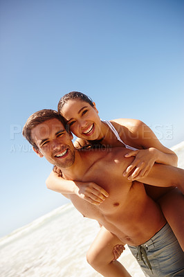 Buy stock photo Vacation, portrait and couple piggy back at the beach with love, hug and support together on holiday in summer. Laugh, sea and happy with smile and bonding by water with travel in Miami with people