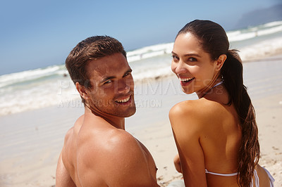 Buy stock photo Couple, portrait and smile by beach with travel for bonding, summer vacation and anniversary getaway on sand. Man, woman and love by ocean with swimwear for adventure, healthy relationship and happy