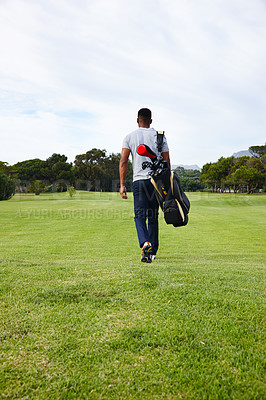 Buy stock photo Sports, bag and walking on golf course with man or athlete outdoor on luxury holiday or vacation. Grass, field and exercise in summer on lawn with person in countryside for training or workout