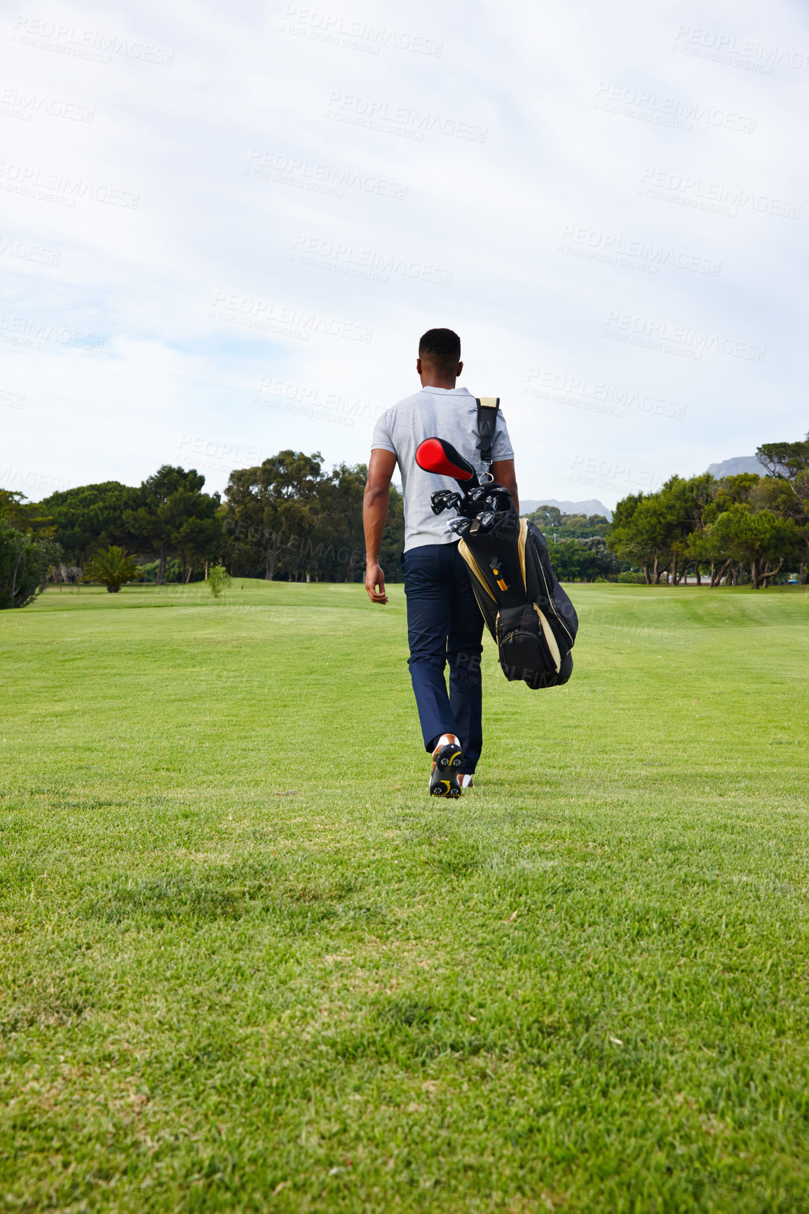 Buy stock photo Sports, bag and walking on golf course with man or athlete outdoor on luxury holiday or vacation. Grass, field and exercise in summer on lawn with person in countryside for training or workout