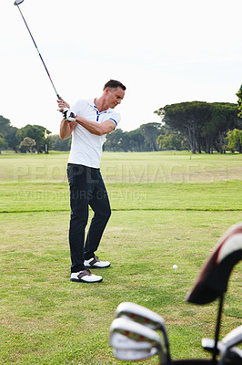 Buy stock photo Man, golfer and swing with club on golf course for game, match or outdoor sport on green grass or field in nature. Male person or player hitting ball on lawn for hole, competition or down the fairway