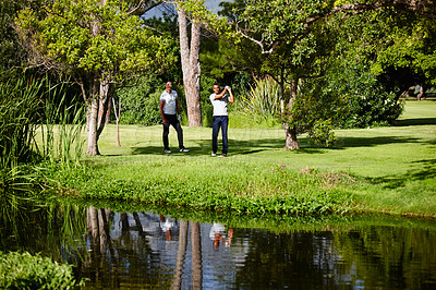 Buy stock photo Summer, sport and people on course for golf game or practice together at club in nature. Friends, training and playing on grass on luxury holiday or vacation in countryside with exercise or challenge