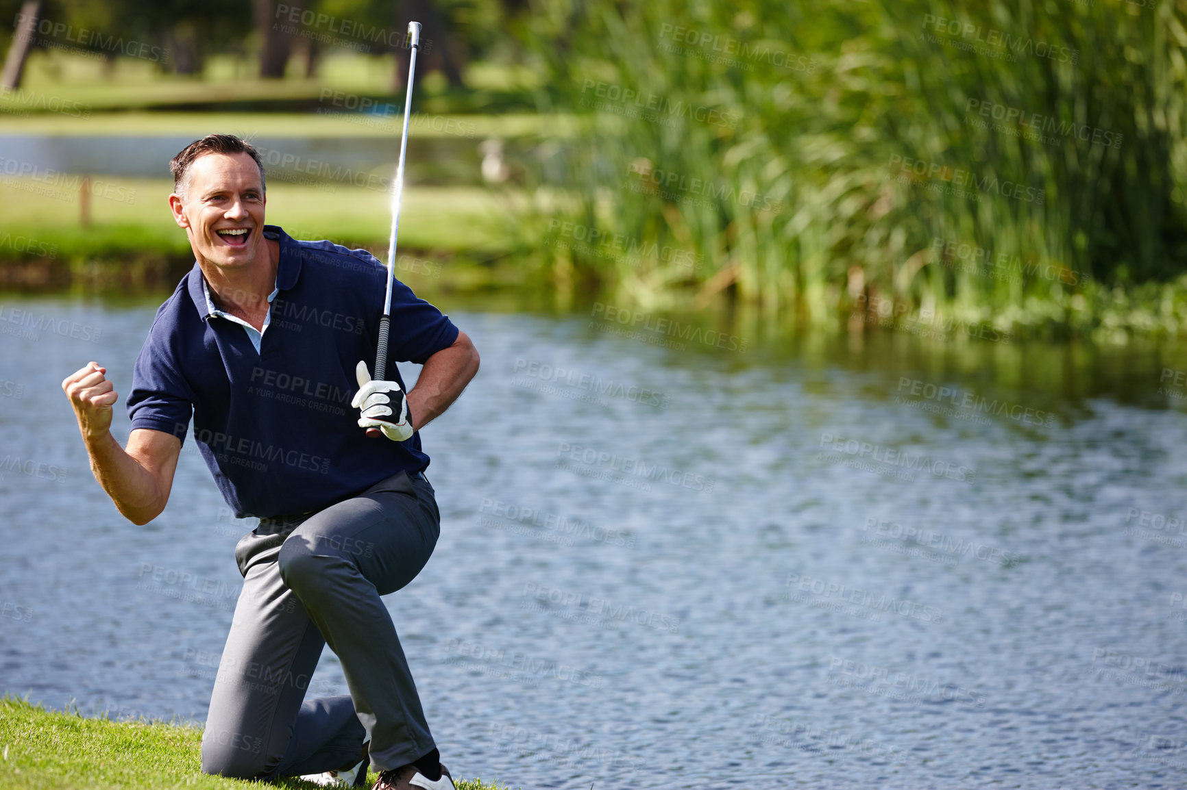 Buy stock photo Happy man, golfer and celebration with fist pump for winning, score or point on grass field in nature. Excited male person or sports player with smile or club in victory or achievement on golf course