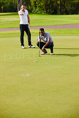 Buy stock photo Athletes, play and aim golf ball at opening for sport, fitness or competition on summer day. Men, watch and concentrate in outdoor tournament on green course for putt, par or birdie on last hole