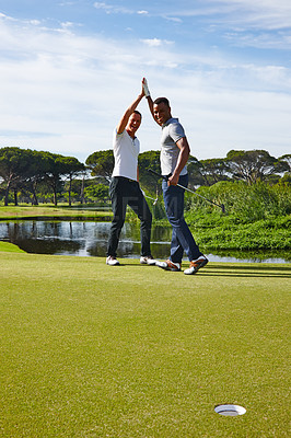Buy stock photo Happy man, high five and celebration with hole on golf course for winning, point or score in nature. Male person, friends or people touching with smile for teamwork, victory or match on grass field