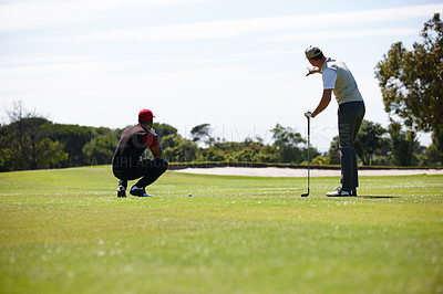 Buy stock photo Men, friends and talk with club on golf course for sports game, outdoor competition or match on green grass. Back view, male people and golfers checking for target, hole or par on field for fitness. 