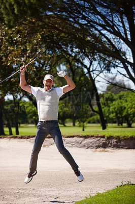 Buy stock photo Happy man, golfer and winning with jump in celebration for victory, score or point by sand pit in nature. Excited male person or sports player with smile on golf course for outdoor match or game