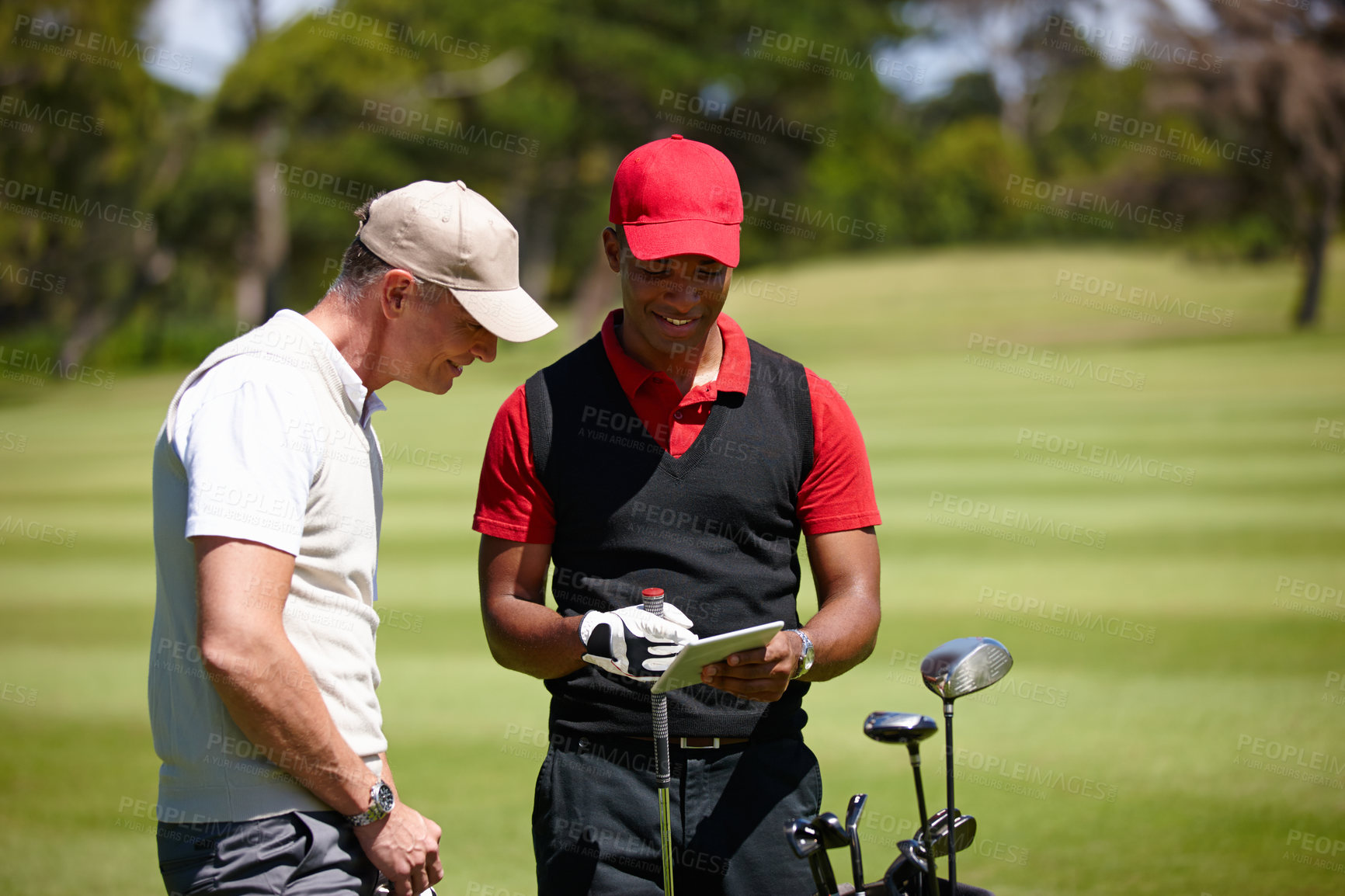 Buy stock photo Golf course, people and technology on field talking from personal trainer with video for learning, coaching and planning. Diversity, tablet and men for sport, wellness and training on weekend