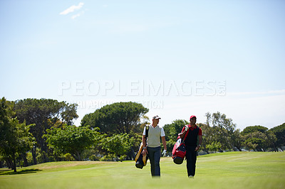 Buy stock photo Walking, course and people outdoor for golf, game and training together at club in summer. Golfer, competition and men on grass turf in park with happiness from practice of sport in healthy challenge