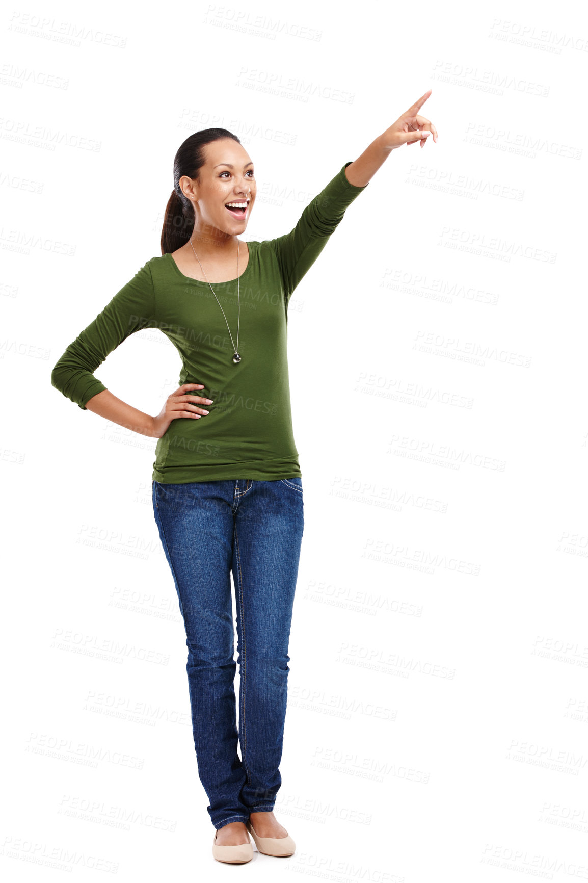 Buy stock photo Surprised, woman and standing while pointing up in portrait as fashion model with trendy green sweater. Shocked, person and gesture for positive announcement on isolated white studio background