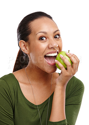 Buy stock photo Woman, portrait and apple for bite in studio, benefits and fruit for nutrition on white background. Female person, smile and pride for detox or minerals for diet, weight loss and organic vitamins