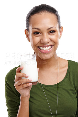 Buy stock photo Woman, portrait and milk for drink in studio, dairy and milkshake for nutrition on white background. Female person, excited and proud of vanilla smoothie for diet, weight loss and organic vitamin d