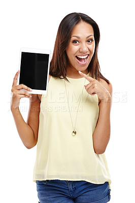 Buy stock photo Portrait of an attractive young woman pointing at the digital tablet she is holding