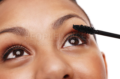 Buy stock photo Closeup, eyes with mascara and woman for beauty, brush for makeup and eyelash on white background. Cosmetology, cosmetics product and wand for lashes, face zoom and volume with makeover in studio