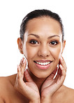 Cropped shot of a beautiful young woman applying facial products to her skin 