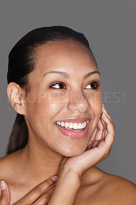 Buy stock photo Smiling woman, skincare and thinking with pride in studio for dermatology, beauty and facial cosmetics. Happy female person, wellness and aesthetic results for confidence isolated on gray background.