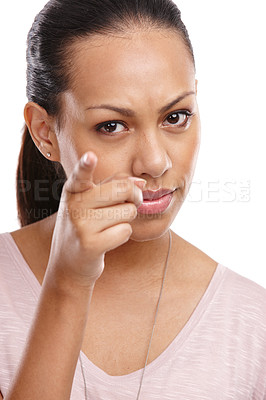 Buy stock photo Strict, discipline and portrait of a woman in a studio scolding, talking or fighting with anger. Upset, mad and female model from Mexico pointing her finger in a argument isolated by white background