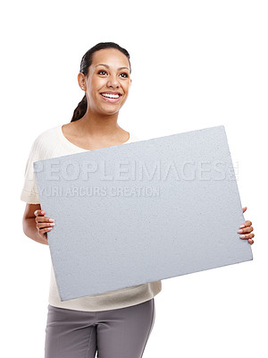 Buy stock photo Advertising, banner and woman on a white background with poster, billboard and gray sign isolated in studio. Marketing, branding mockup and happy female model for announcement, news and information