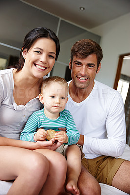 Buy stock photo Family, happiness in portrait and parents with kid at home, love and security with parenting, childhood and bonding. Support, trust and care with man, woman and boy in bedroom, smile and positivity