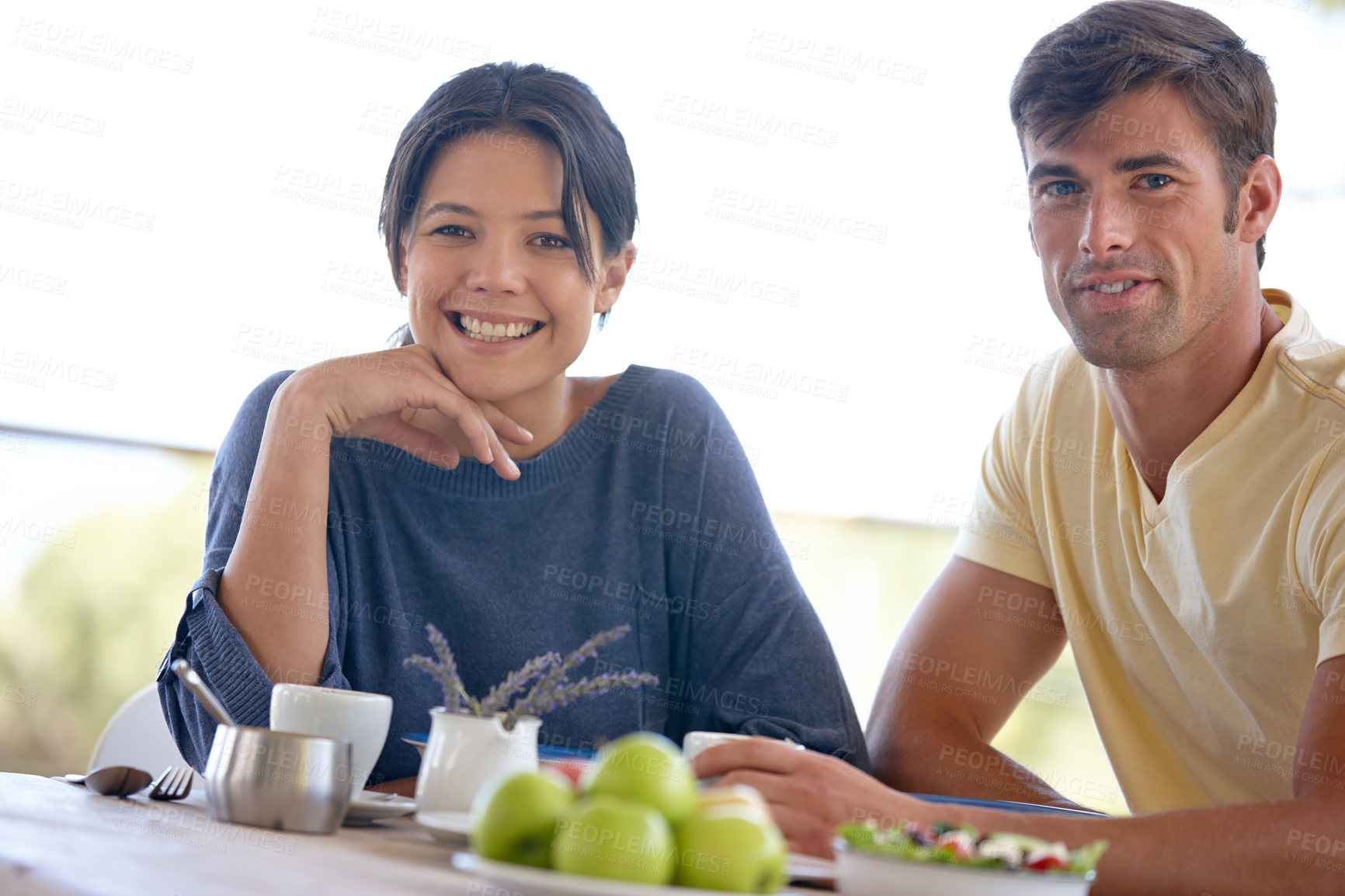 Buy stock photo Couple, portrait and breakfast outdoor with smile, fruit and coffee for health, nutrition and wellness. Man, woman and food with in summer for morning, energy and sunshine or tea by table together