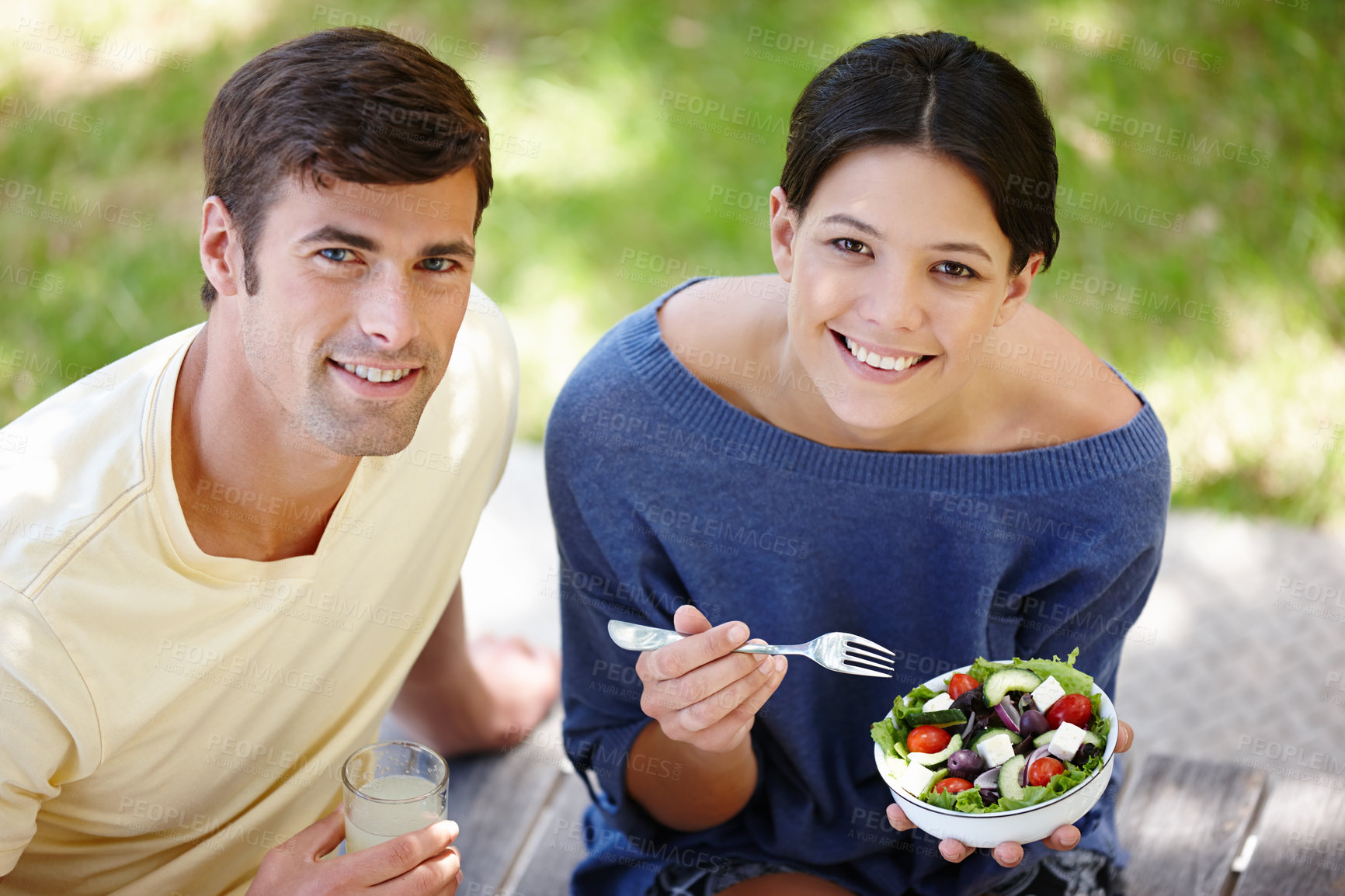 Buy stock photo Couple, smile and healthy with salad in park for picnic, nutrition with diet from above. Man, woman and lunch or eating with happiness for relationship, together in garden in Auckland or New Zealand