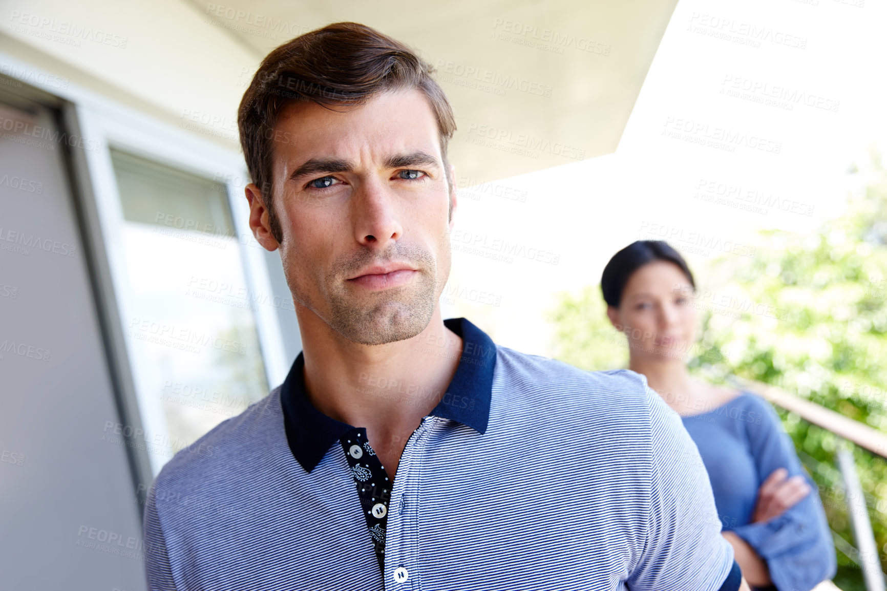 Buy stock photo Portrait, man and frustrated in outdoor for relationship conflict with stress, fight and tension. Sad face, person and trouble for divorce on home balcony with unhappy couple, problem and breakup