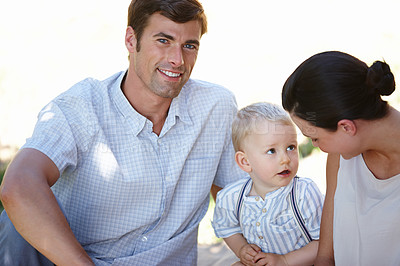 Buy stock photo Cropped shot of a family spending time together on a summer's day 