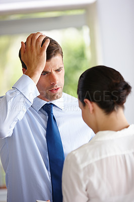 Buy stock photo Confused, businessmen and employee with tablet, talking and conversation for bad performance at work in office. Sad, worker and dissapointed mangaer with communication for fatigue in workplace