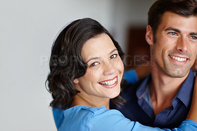 Buy stock photo Portrait, happy and woman to embrace husband in lounge for weekend away with support, trust and love as partners. Married, couple and vacation for romance break, relax and bonding in safety of home