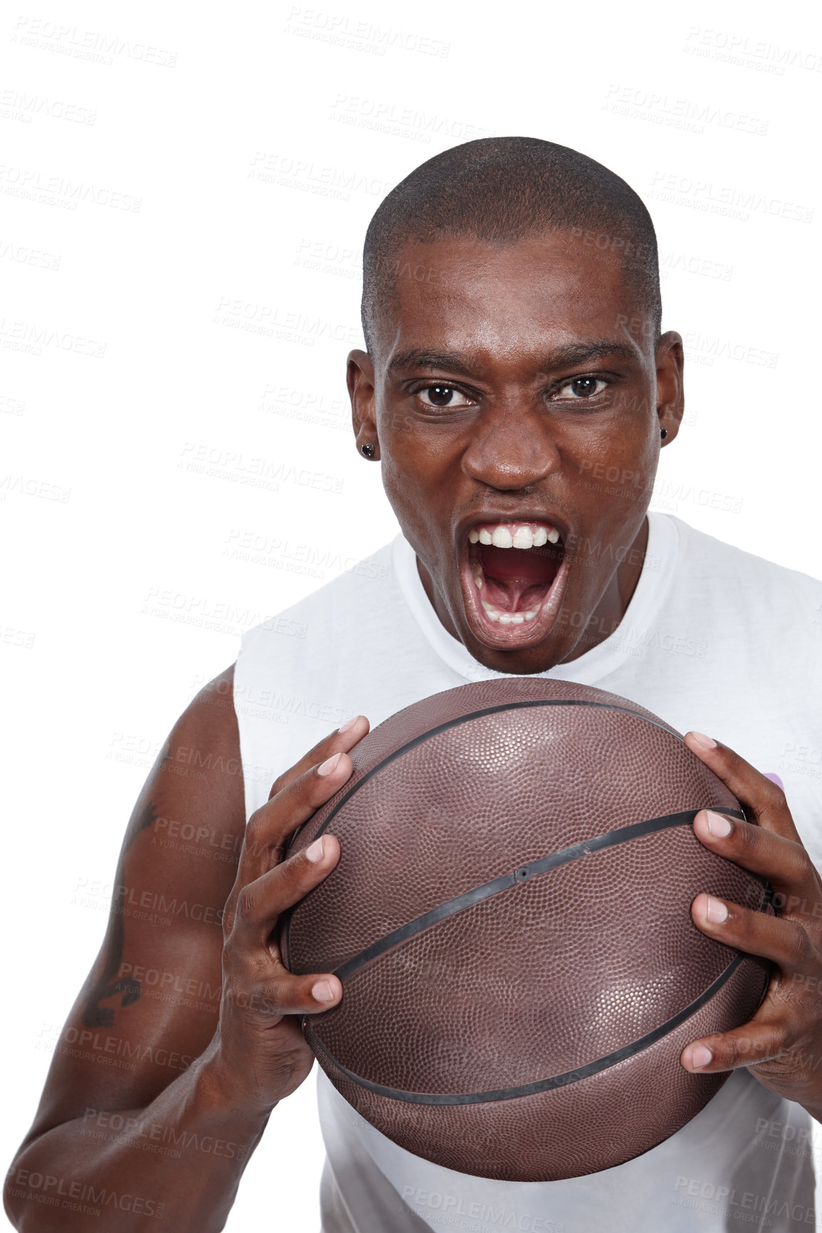 Buy stock photo Studio shot of a determined young basketball player shouting while holding a basketball