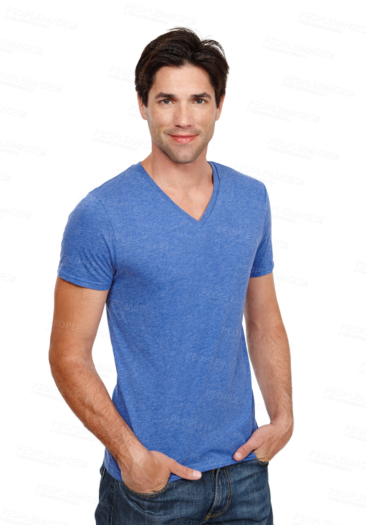 Buy stock photo Portrait of one handsome young man standing alone while isolated against a white background in the studio with copyspace. Smiling and happy model posing and feeling confident with his hands in pockets