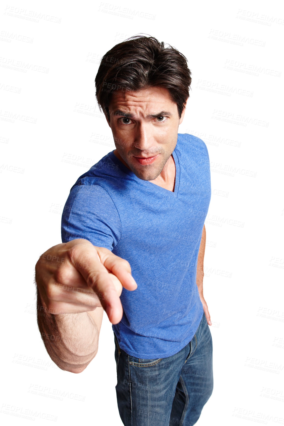 Buy stock photo Studio portrait of a handsome man frowning while pointing at the camera. A good-looking male model. A young man standing with an angry face. Annoyed man pointing index finger. 