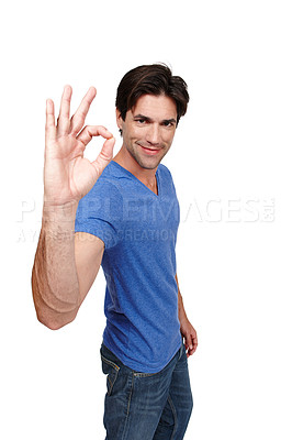 Buy stock photo Portrait, ok and man in studio for approval, good decision and agreement with hand sign. White background, positive gesture and face of isolated male person with smile for yes, consent and happiness