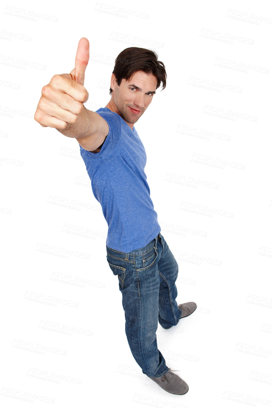 Buy stock photo High angle studio portrait of a handsome young man showing thumbs up