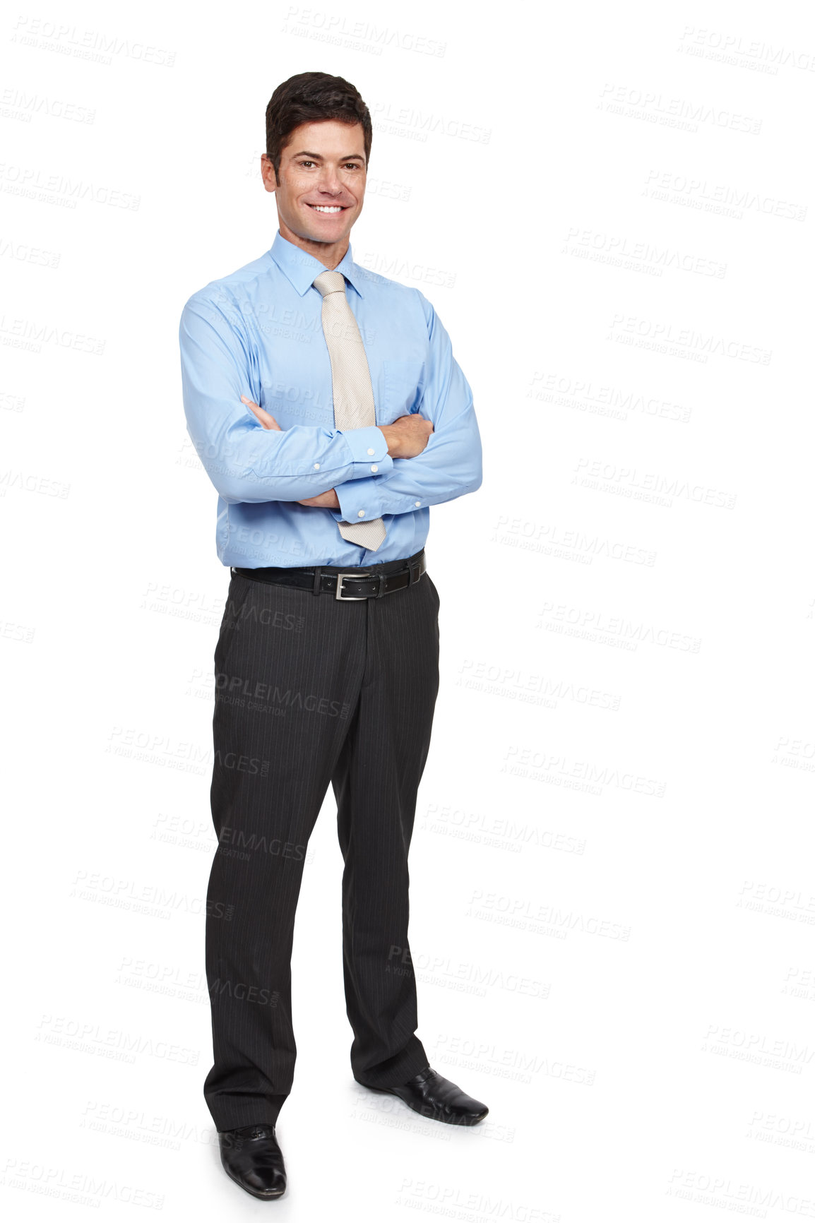 Buy stock photo Full length studio portrait of a well dressed businessman standing with his arms crossed against a white background. A young entrepreneur looking confident and proud, feeling positive positive