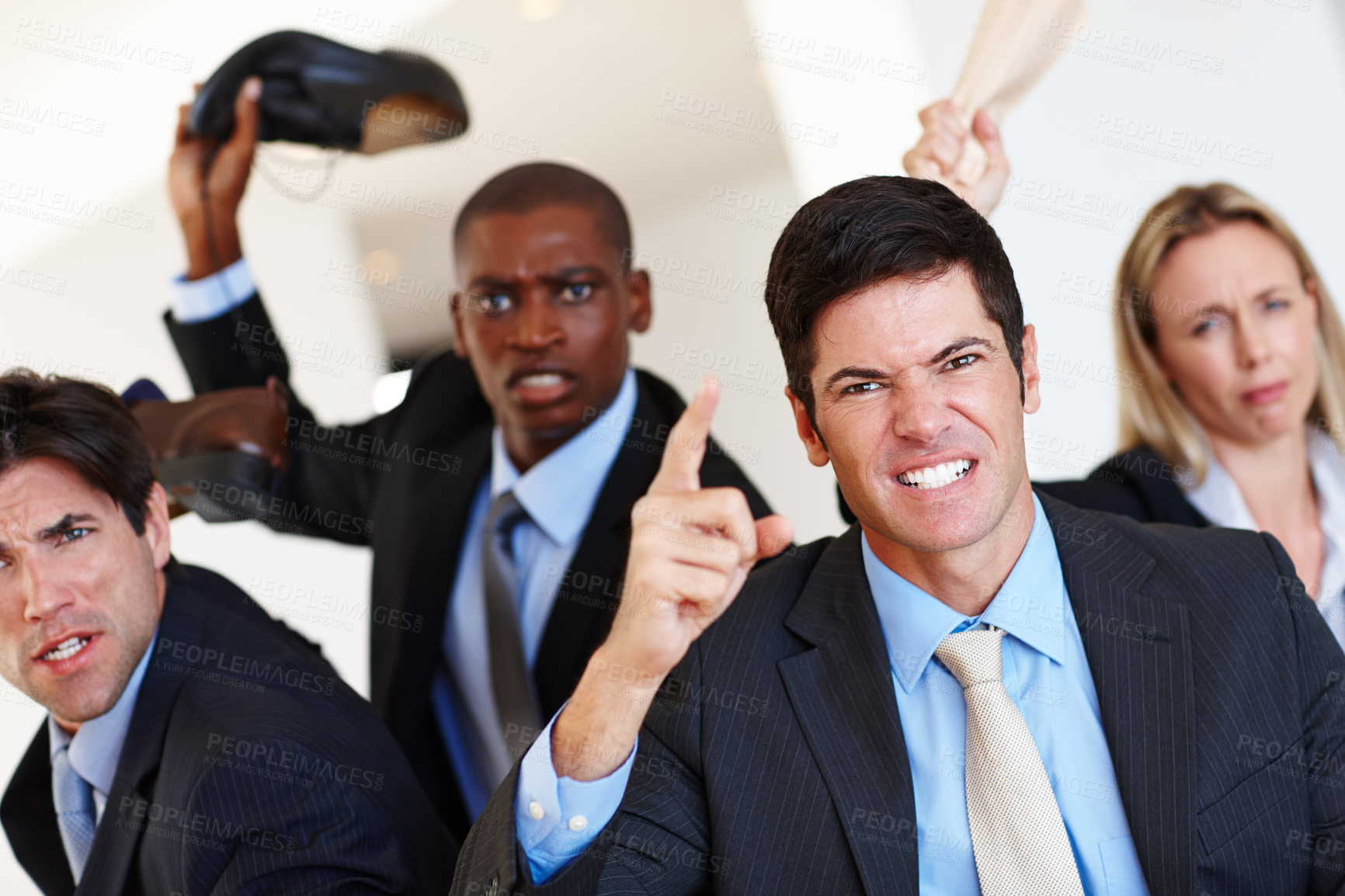Buy stock photo Shot of an angry mob of business professionals