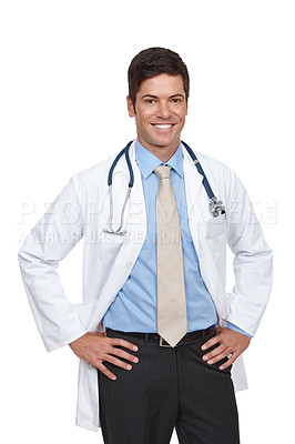 Buy stock photo Studio shot of a young doctor standing with his hands on his hips
