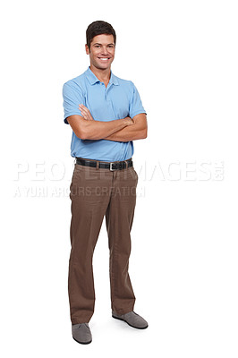 Buy stock photo Studio shot of a casually dressed young man standing with his arms crossed