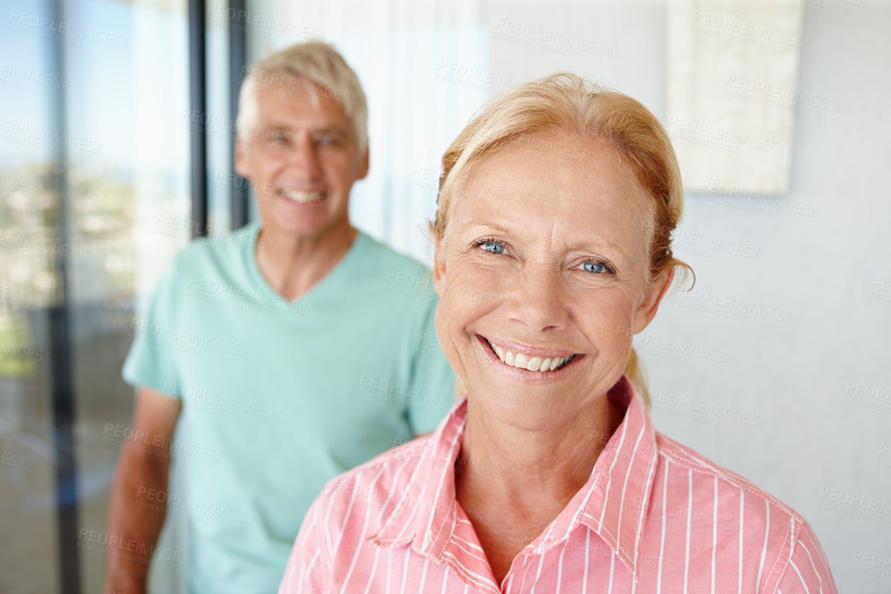 Buy stock photo Portrait of a mature couple at home