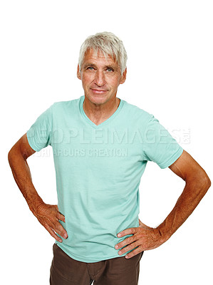 Buy stock photo Portrait of one serious mature man standing alone with his hands on his hips and isolated against white background in studio with copyspace. Focused senior model with attitude. Assertive and curious